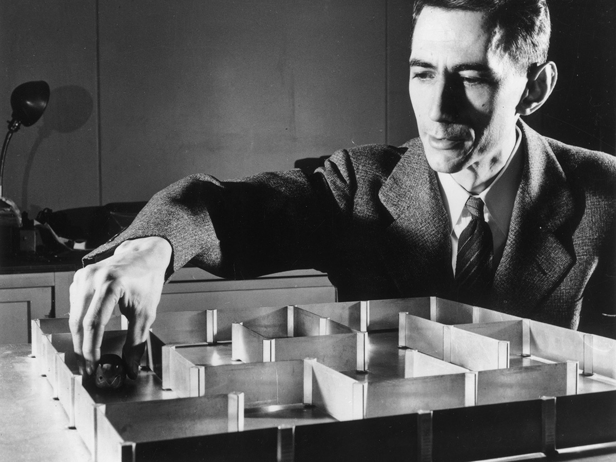 Claude Shannon with 'Theseus' Maze-Solving Mouse, 1952. 